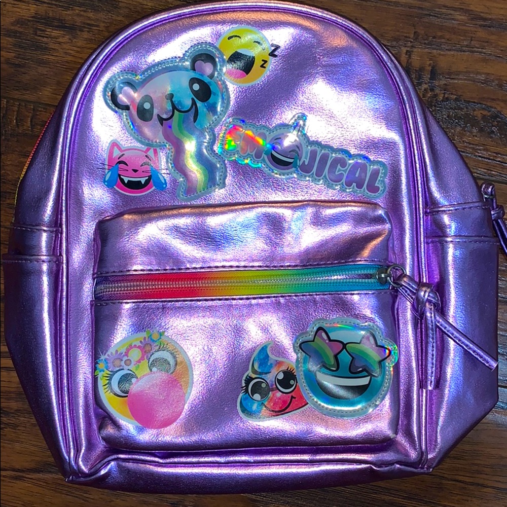 Claire’s purple shimmery mini backpack